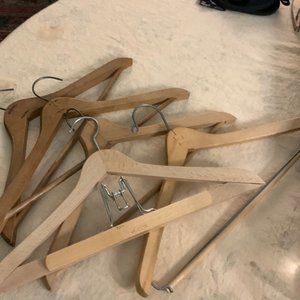 Five vintage wooden hangers